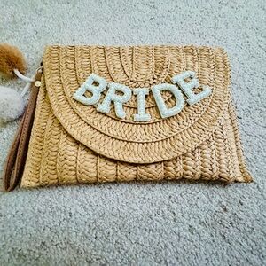 Tan Clutch with Textured Design and Wristlet